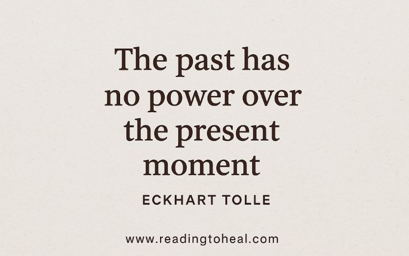 Eckhart Tolle quote on the past having no power over the present, set against a golden meadow.
