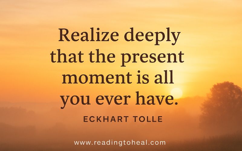 Eckhart Tolle quote 'Realize deeply that the present moment all you ever have' on a misty mountain background.