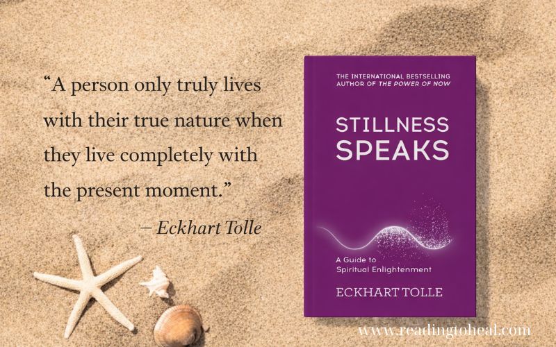 A quote by Eckhart Tolle on a sandy beach background: 'A person only truly lives with their true nature when they live completely with the present moment.' Next to a purple edition of the book Stillness Speaks.
